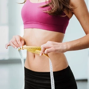 Weight Loss St. Louis MO Woman Measuring Waistline